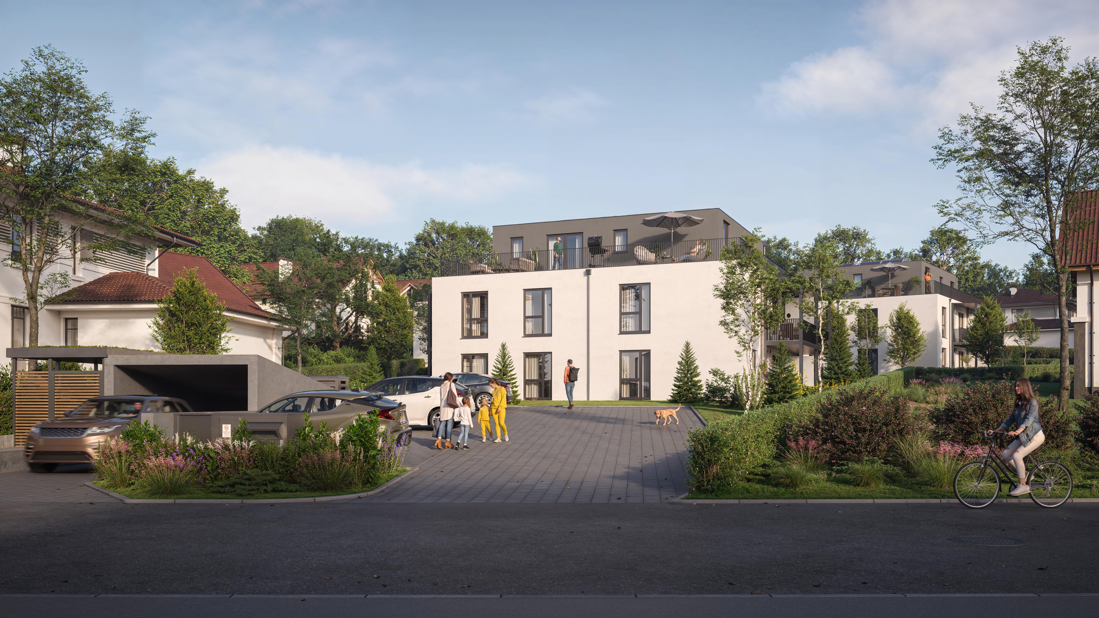 City Suites street view with light façades, penthouse terraces, and a landscaped driveway in Pfarrkirchen