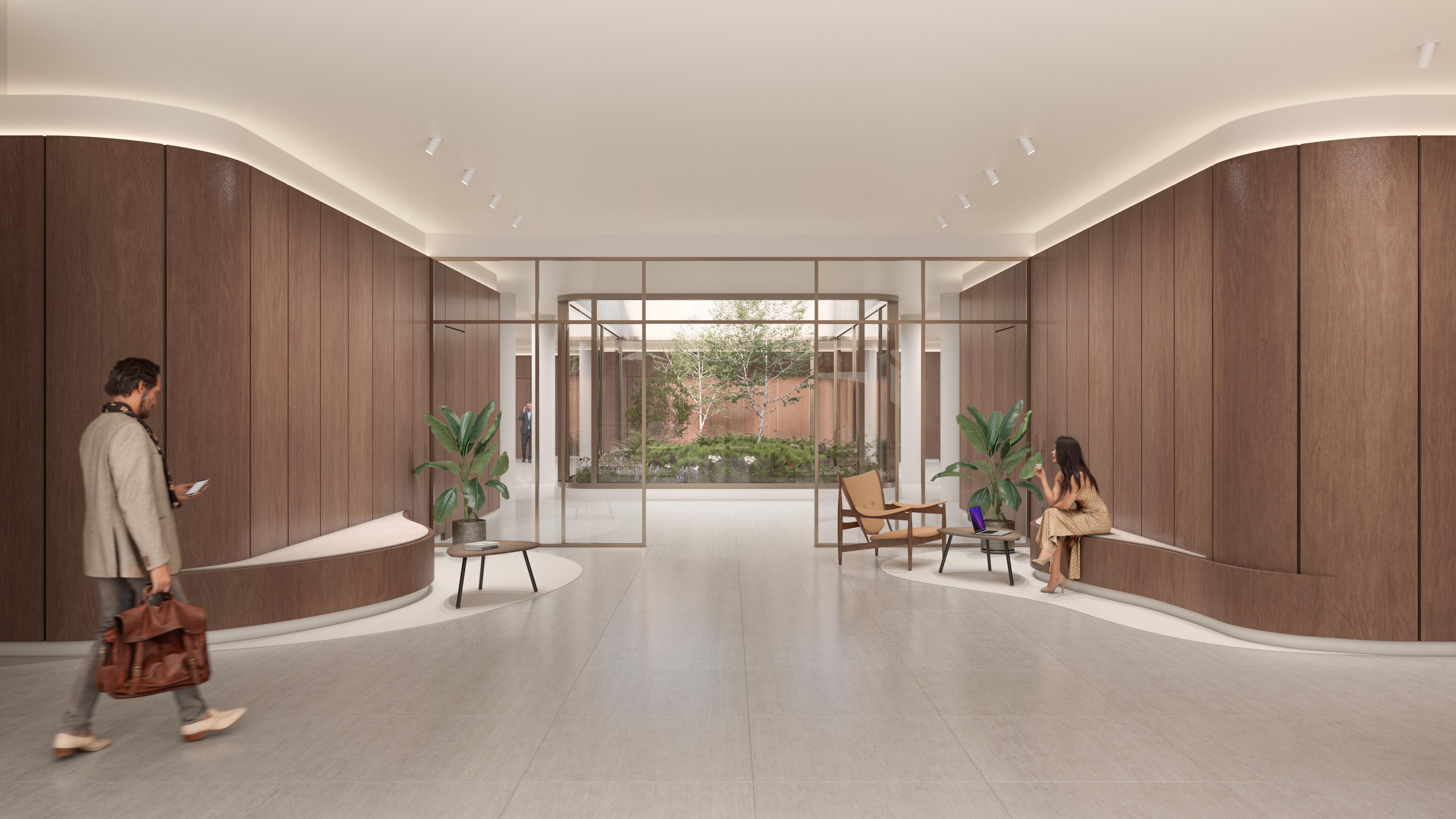 Zuid Zicht lobby with curved built-in benches and a glazed view towards a planted courtyard